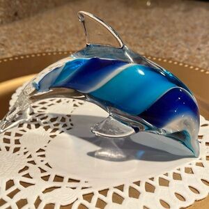 Beachcombers Dolphin glass 6” figurine in navy, light blue & white swirls.
